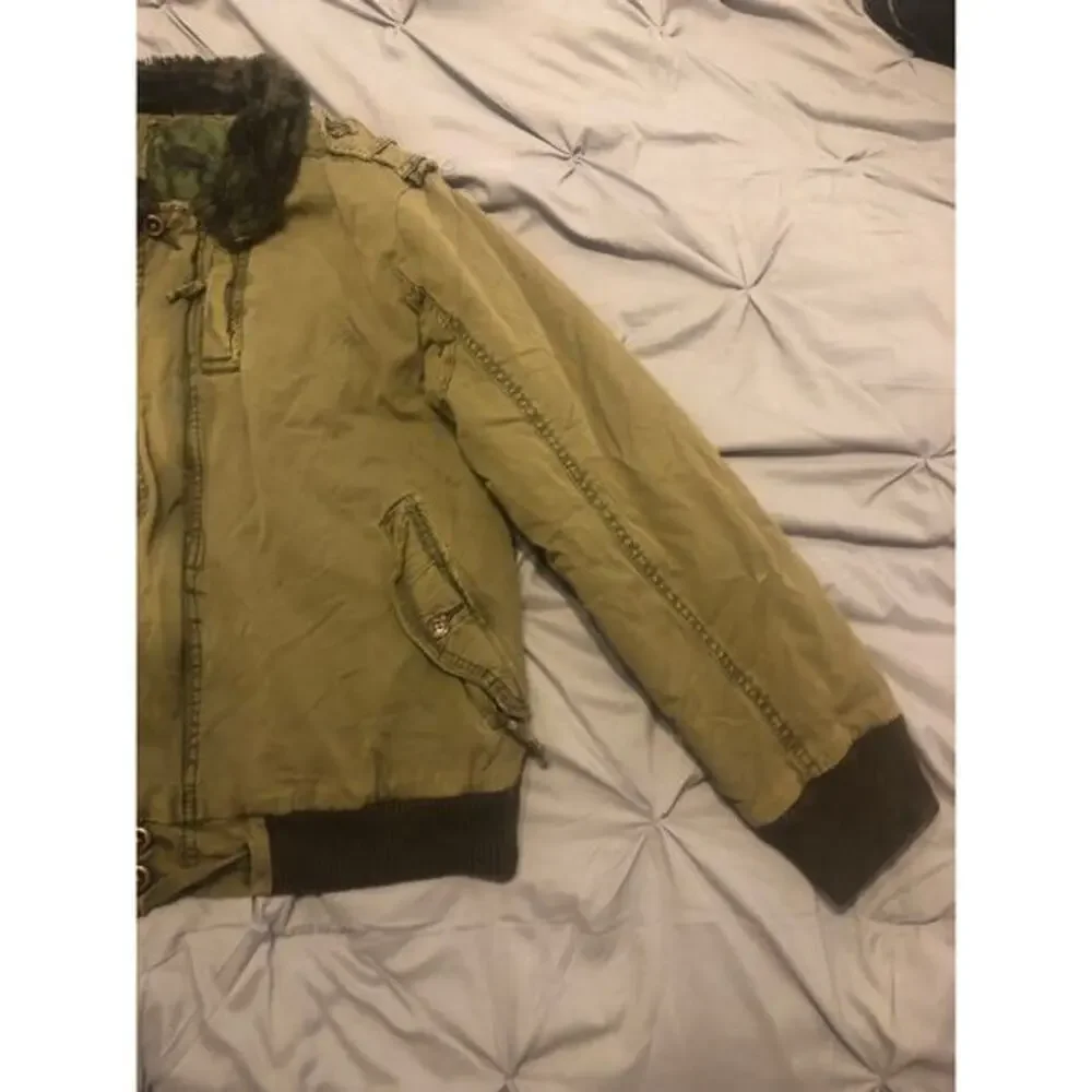 Olive green jacket‎ size L